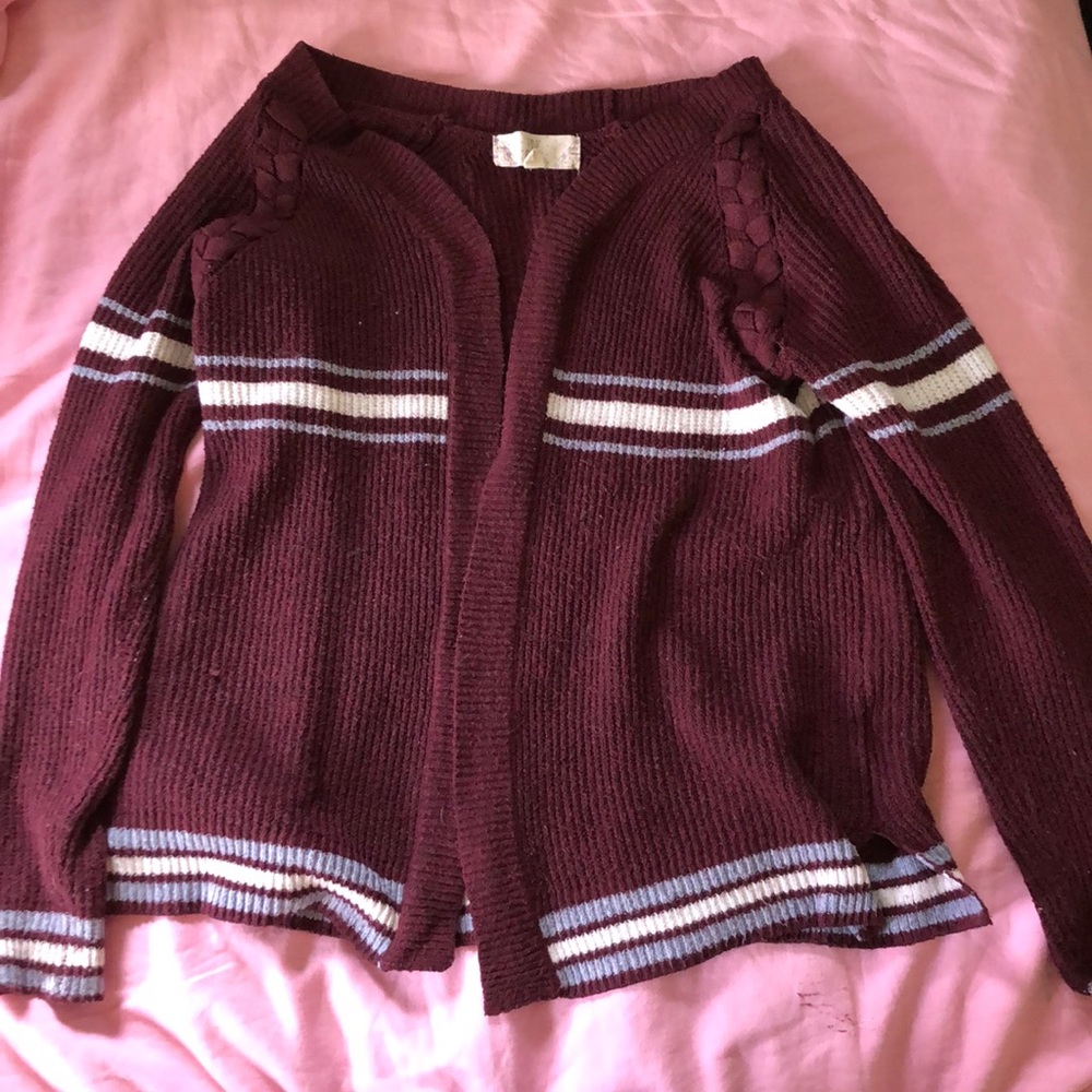 Cute maroon sweater.